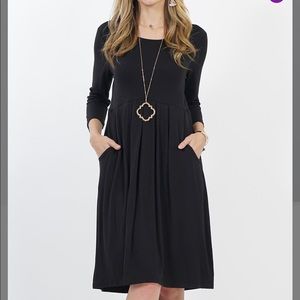Dress with pockets with elbow length sleeves